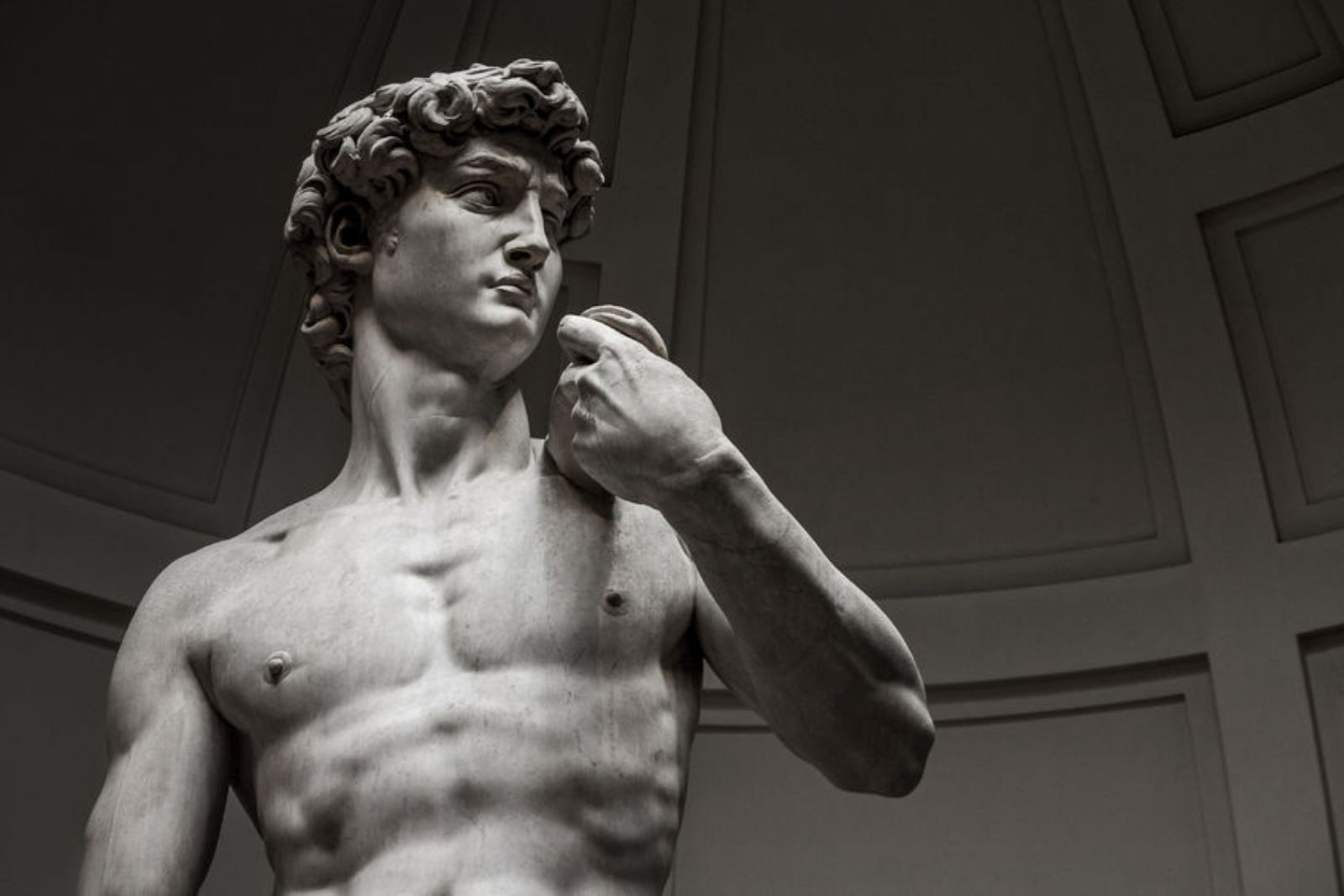Illustration for: How many David Beckhams does Michelangelo's statue of David weigh?